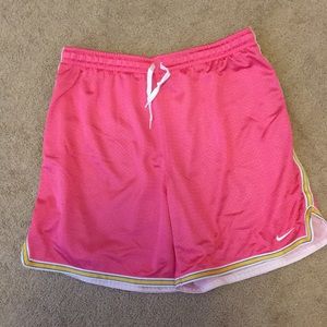 Pink Nike basketball shorts